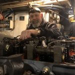 Joe tuning up our 1941 Hamilton Diesel Engine- the only one still operating in the world!